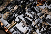 A Lot Of Rifles, Guns, Grenades, Helmets, Gas Masks, Ammunition, Vests, Devices And Other Military Gear.