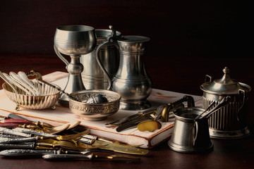 Old silver dishes with accessories for the kitchen