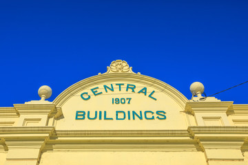 Wall Mural - Close-up of Central Buildings 1907 sign on Avon Terrace in York, a popular tourist town east of Perth in Avon Valley. York is oldest inland settlement in Western Australia. Blue sky with copy space.