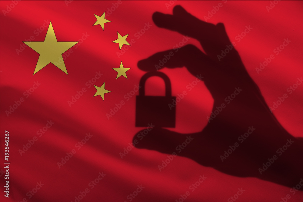 China closed lock in the hand. Import and export of goods from the world market of trade is prohibited. Closed borders for tourists and immigrants. Epidemic virus Top Secret Information