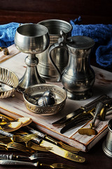 Wall Mural - Old silver dishes with accessories for the kitchen