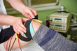 © dobok - Electronic appliance: electronic therapy on knee