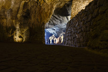Tourists Visiting The Caves Of Hercules, Located In The North Of Morocco, Africa