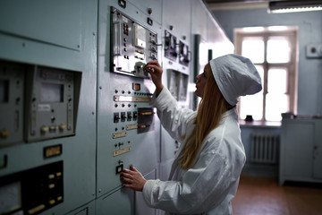 Nuclear plant engineer working at thermal power plant 