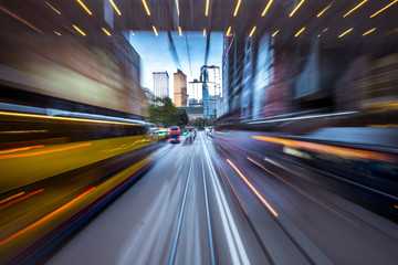 Wall Mural - Blurred Motion Travel in Business District of Hong Kong