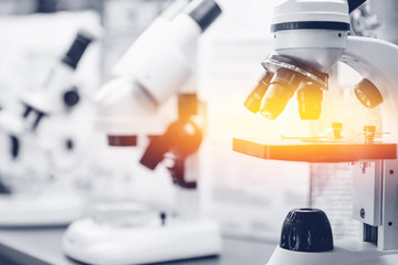 Wall Mural - microscope biotechnology. medical equipment research. background medicine
