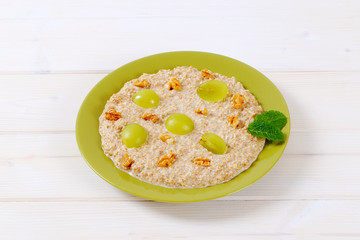 Wall Mural - plate of oatmeal porridge