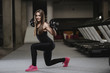 © antondotsenko - strong sexy athletic young girl working out in gym