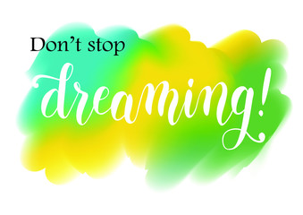 Calligraphy lettering of motivational phrase Don't stop dreaming in black and white on colorful stylized as watercolor painting background for decoration, poster, postcard, sticker