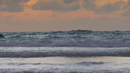 Wall Mural - ocean shorline with incoming waves, low level shot