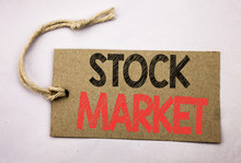Hand Writing Text Caption Inspiration Showing Stock Market. Business Concept For Equity Share Exchange Written On Price Tag Paper On The White Vintage Background.