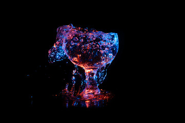 glass overflowing with liquid