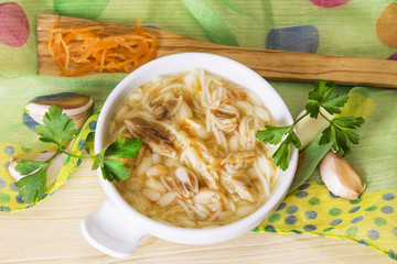 Wall Mural - noodle soup and chicken with carrot and garlic