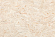 Clean surface of wood particle Board. Texture of compressed wood chippings board.