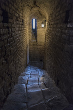 Stone Interior With Window Of An Old Steeple Crypt, Located Inside An Ancient Catholic Church