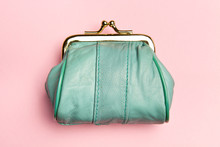Purse For Coins.Wallet For Change. Leather Purse, Purse On A Pink Background. Color Of The Trend.The Concept Of Poverty