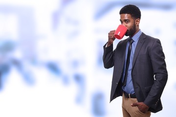 Young businessman in front of a blurred background