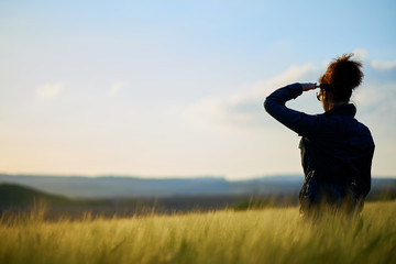 Young woman looks afar