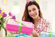 © Kalim - Attractive woman with Easter presents