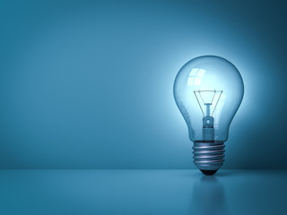 Idea light bulb glowing on the dark blue background with reflection . 3D rendering.