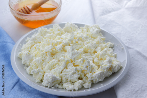 Fresh Cottage Cheese With Honey On A White Background Soft Cheese