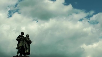 Wall Mural - statue and clouds in frankfurt