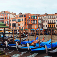 Majestic canals in Venice, and water traffic,Venice, Italy. Gondola in a canal in Venezia Italy. Venice is a city in northeastern Italy and the capital of the Veneto region.