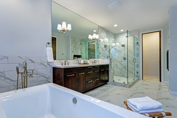 Incredible marble bathroom with fireplace.