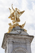 Gilded Winged Peace and Victory at the top of the Victoria Memorial in front of the Buckingham Palace, London, United Kingdom