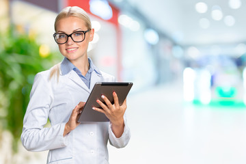 Poster - Smiling medical woman doctor