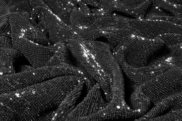 Wall Mural - Black fabric with paillettes Make a dazzling debut  this Black Baby Sequined  The coating of the strength of the continuous mesh remains a dense arrangement of circular glitters for the entire coating