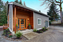 Charming Newly Renovated Home Exterior With Mixed Siding