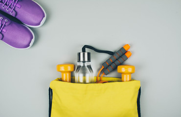 Creative flat lay of sport and fitness equipments