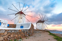 Famous View, Traditional Windmills On The Island Mykonos, The Island Of The Winds, At Sunrise, Greece