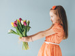 © Photocreo Bednarek - Young child holding a bunch of fresh flowers