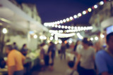 Fototapeta  - Vintage tone blurred defocused night of walking street festival in thailand bokeh background
