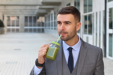 Healthy entrepreneur enjoying a healthy drink 