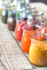 Canvas Print - Assortment of sauces in the glass jars