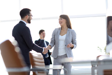 Canvas Print - handshake between colleagues in the workplace