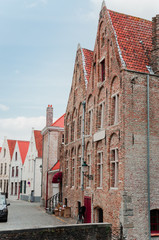 Beautiful narrow streets and traditional houses in the old town of Bruges (Brugge), Belgium