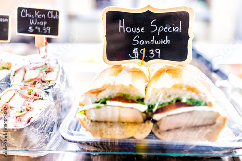 House special sandwich sign with prices on display with bread ...