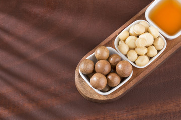 Wall Mural - Oil and macadamia nuts - Macadamia integrifolia