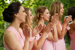 © Wedding photography - Bridesmaids applauding at wedding ceremony