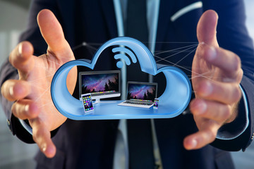 Wall Mural - devices like smartphone, tablet or computer displayed in a cloud- 3d render