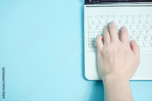 The Hand Which Use The Keyboard Of The Note Pc For Keyboard Of The Alphabet Sequence キーボードを打つ手 アルファベット配列のみ 水色背景 Stock Photo Adobe Stock