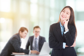 Wall Mural - Beautiful young asian businesswoman smiling in office