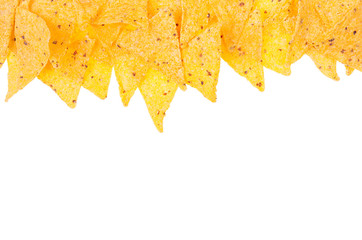 Snack nachos as decorative food border isolated on white background, top view.