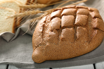 Poster - Loaf of freshly baked bread on table