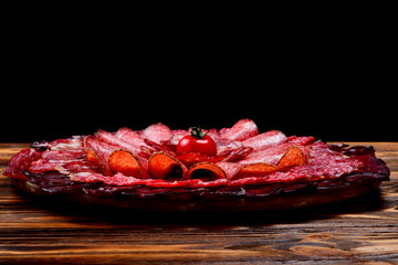 Wall Mural - Different kinds of meat cuts on the boards. On a wooden background.