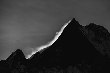 black and white photo of himalaya mountain on sunrise.